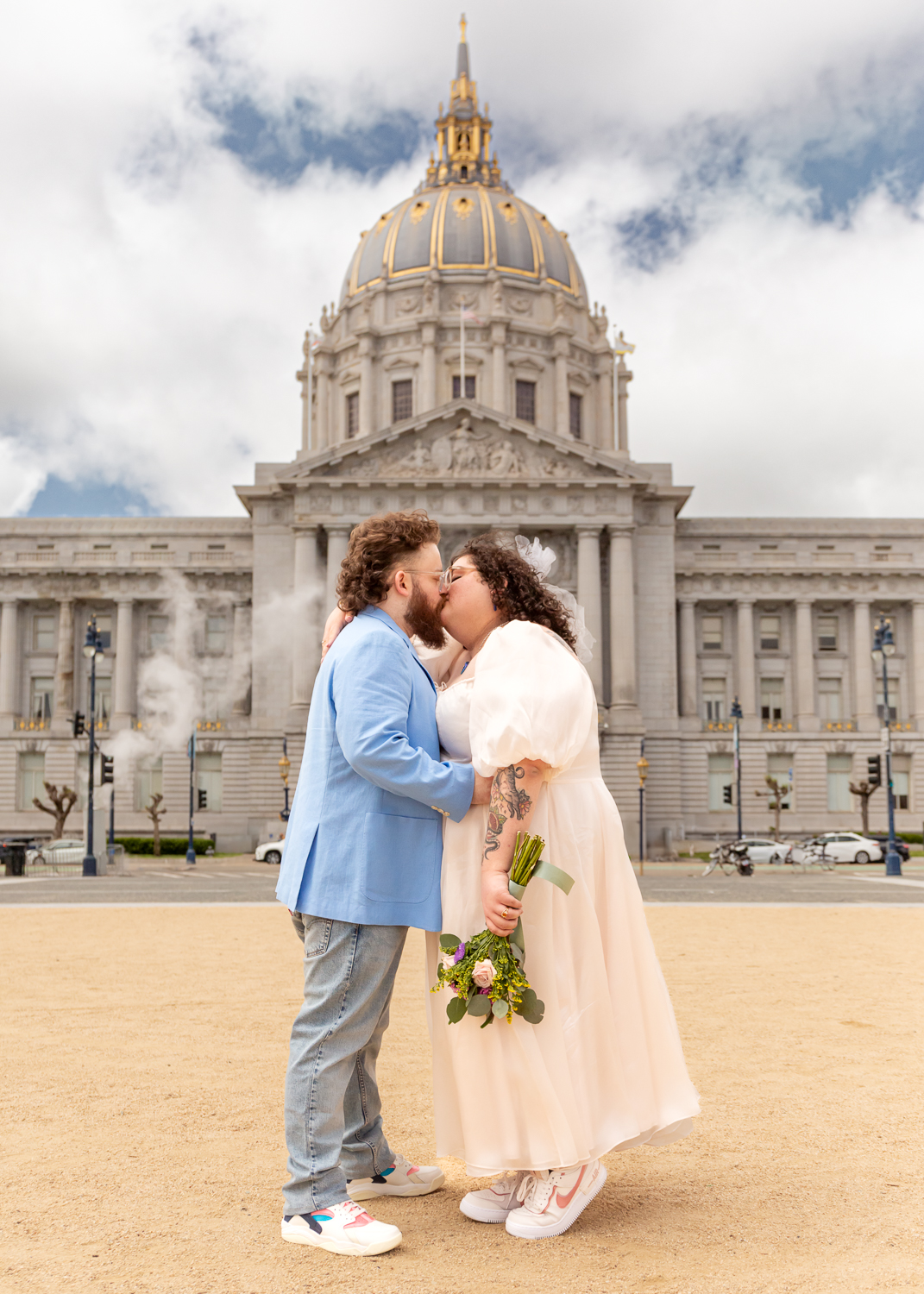 LGBT couple kiss outside SF City Hall