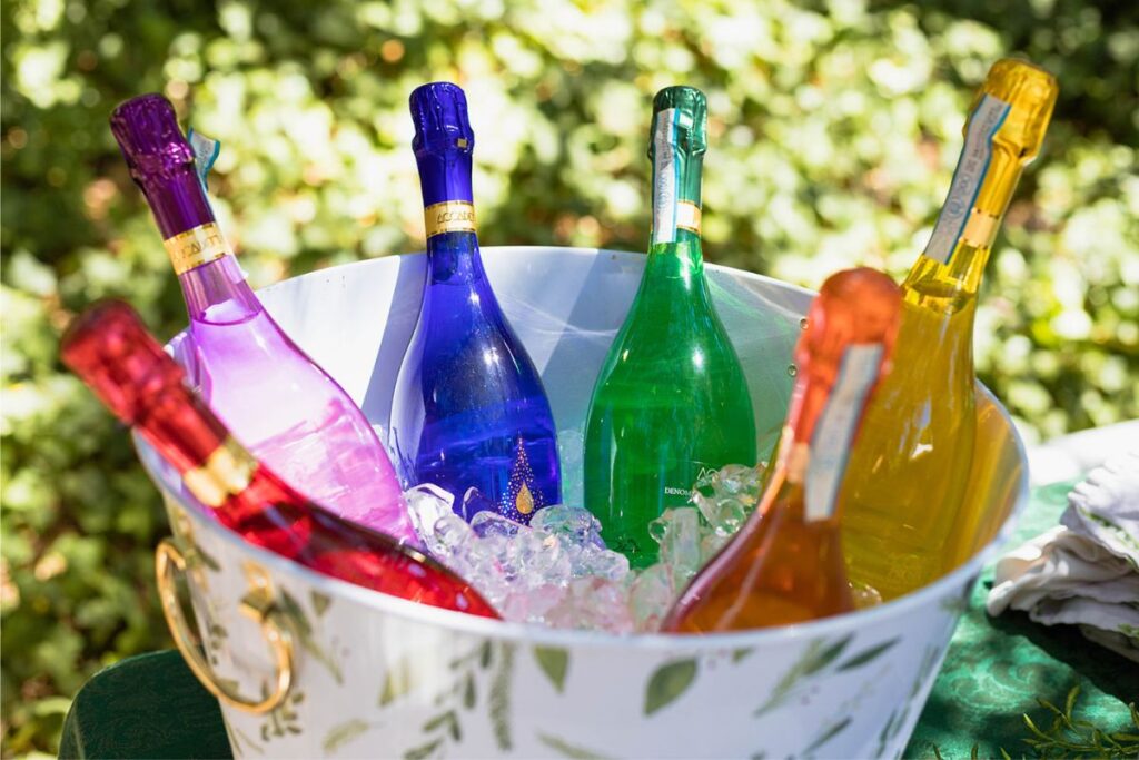 rainbow alcohol bottles as one of the nontraditional wedding ideas