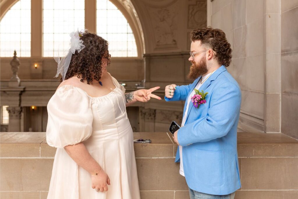 A couple playing rock paper scissors