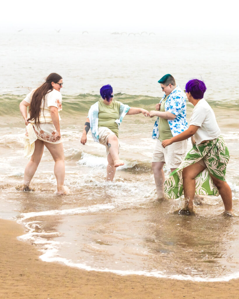 Nova and Arden splashing with their friends