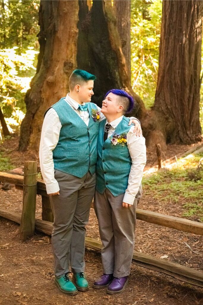 Nova and Arden posing for their neurodivergent wedding