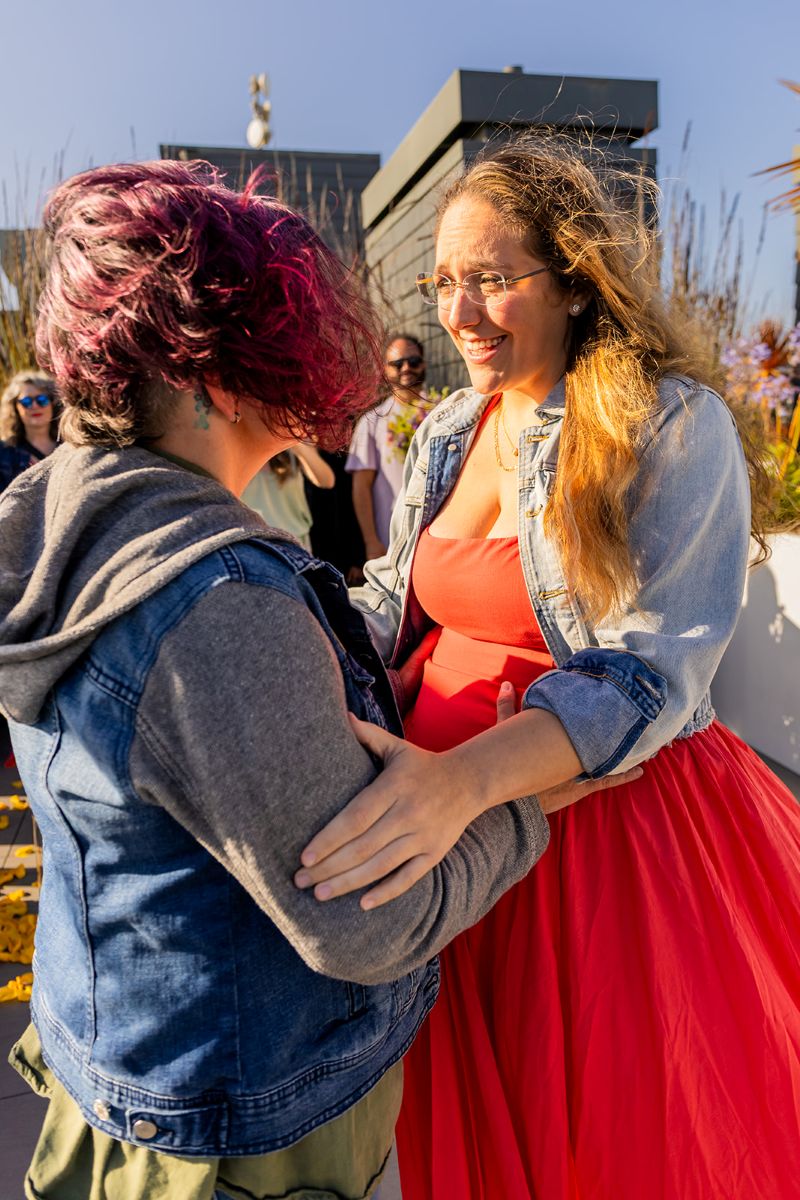 a couple getting emotional during their surprise proposal