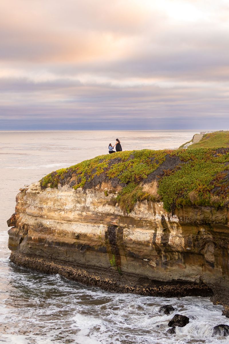 a surprise lgbtq+ proposal at sunset on west cliff drive 